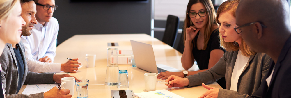 Business Associates Sitting Around a Table